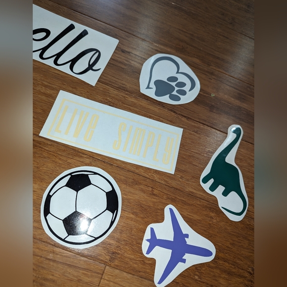 11 Assorted vinyl decals. Sports. Pets. Hello. Dinosaurs. #1. - Picture 2 of 6